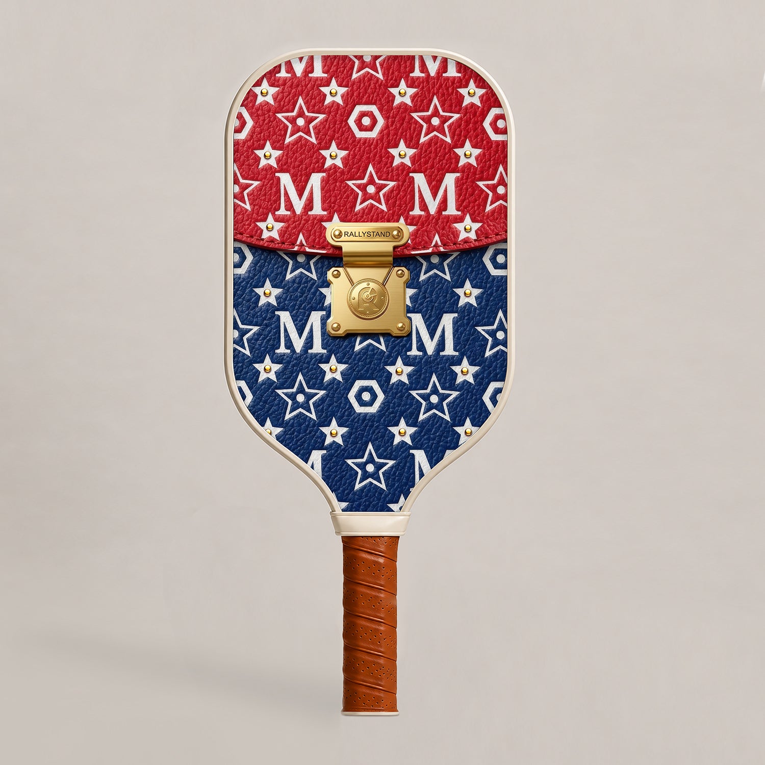 Front view of a luxury RallyStand pickleball paddle featuring a college red, white, and blue designer handbag aesthetic with gold hardware accents. Main image