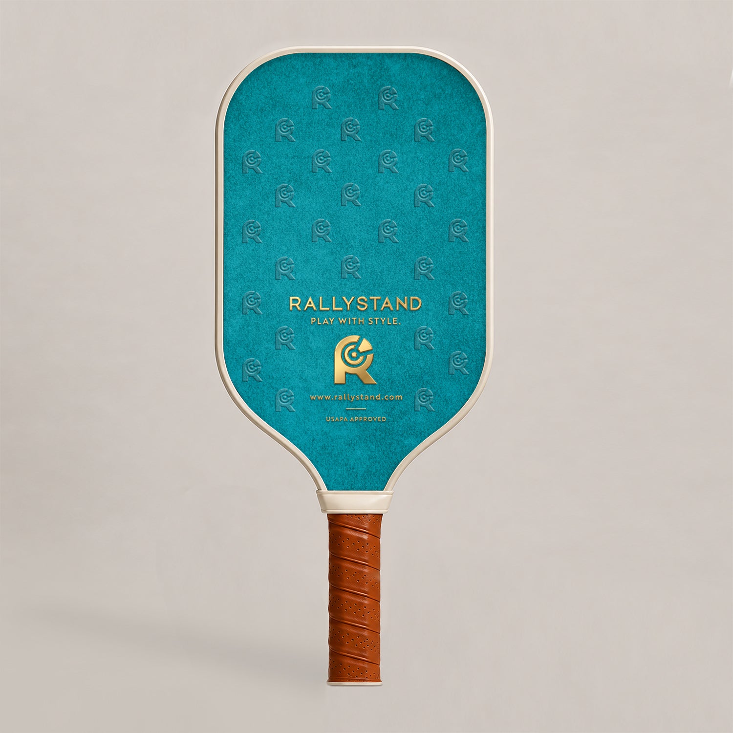 Back view face of RallyStand luxury designer performance pickleball paddle with teal monogram background pattern and a gold brand logo emblem.