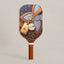 Front view of RallyStand's Grand Trunk pickleball paddle in blue, showcasing a luxury monogram pattern, brown leather graphics, and engraved gold luggage tags.